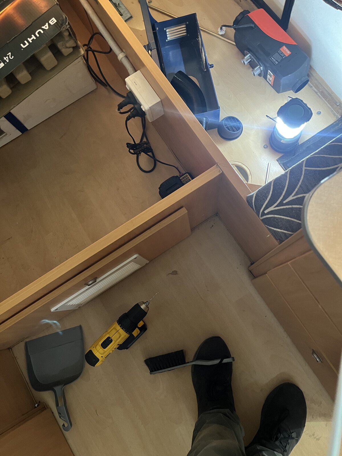 Vevor heater unit and wiring positioned in under-seat cabinet during install